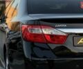 Черный Тойота Камри, объемом двигателя 2.5 л и пробегом 235 тыс. км за 16500 $, фото 40 на Automoto.ua