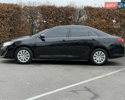 Чорний Тойота Камрі, об'ємом двигуна 2.49 л та пробігом 199 тис. км за 10999 $, фото 10 на Automoto.ua