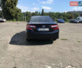 Черный Тойота Камри, объемом двигателя 2.5 л и пробегом 280 тыс. км за 12500 $, фото 1 на Automoto.ua