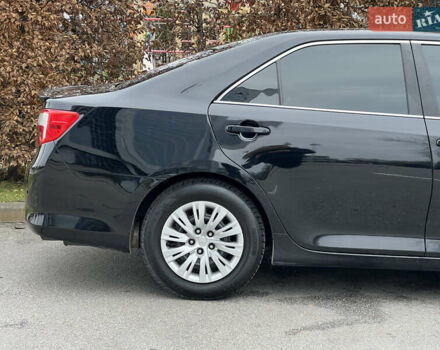 Чорний Тойота Камрі, об'ємом двигуна 2.49 л та пробігом 199 тис. км за 10999 $, фото 24 на Automoto.ua