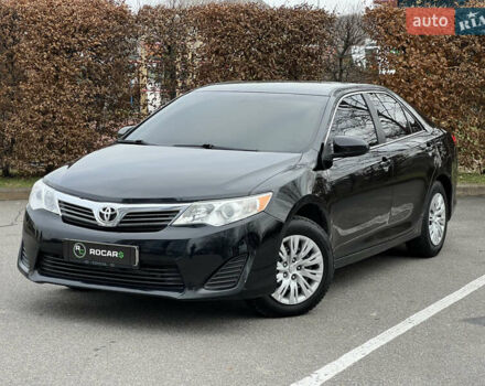 Чорний Тойота Камрі, об'ємом двигуна 2.49 л та пробігом 199 тис. км за 10999 $, фото 6 на Automoto.ua