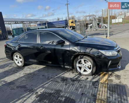 Черный Тойота Камри, объемом двигателя 2.49 л и пробегом 142 тыс. км за 13200 $, фото 10 на Automoto.ua