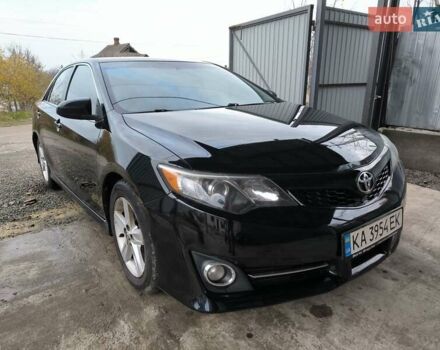 Чорний Тойота Камрі, об'ємом двигуна 2.5 л та пробігом 279 тис. км за 10500 $, фото 1 на Automoto.ua