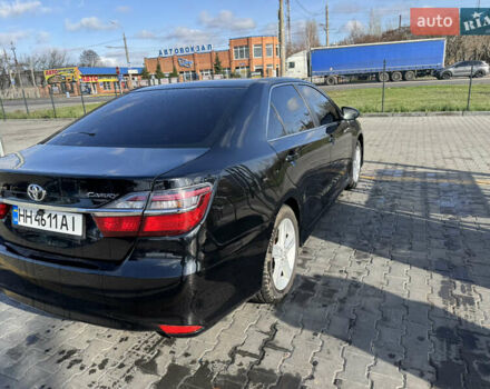 Черный Тойота Камри, объемом двигателя 2.49 л и пробегом 142 тыс. км за 13200 $, фото 7 на Automoto.ua