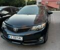 Чорний Тойота Камрі, об'ємом двигуна 2.49 л та пробігом 250 тис. км за 10599 $, фото 1 на Automoto.ua