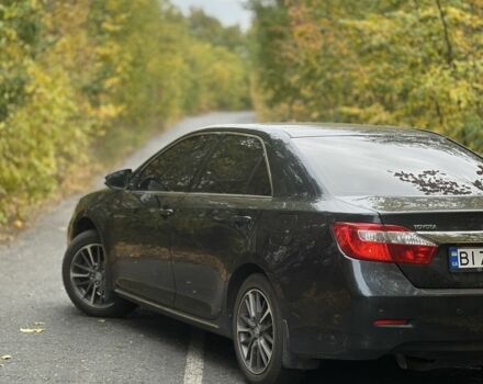 Черный Тойота Камри, объемом двигателя 2.5 л и пробегом 280 тыс. км за 12100 $, фото 2 на Automoto.ua