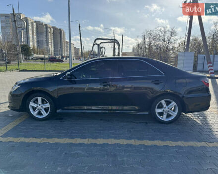 Черный Тойота Камри, объемом двигателя 2.49 л и пробегом 142 тыс. км за 13200 $, фото 3 на Automoto.ua