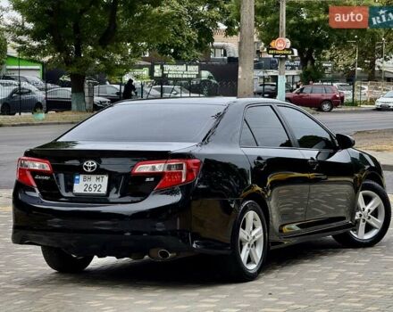 Черный Тойота Камри, объемом двигателя 2.5 л и пробегом 196 тыс. км за 13600 $, фото 17 на Automoto.ua