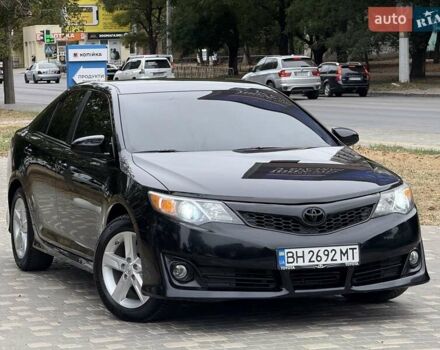 Черный Тойота Камри, объемом двигателя 2.5 л и пробегом 196 тыс. км за 13600 $, фото 26 на Automoto.ua