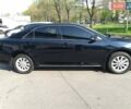 Черный Тойота Камри, объемом двигателя 2.49 л и пробегом 129 тыс. км за 14700 $, фото 1 на Automoto.ua