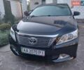 Черный Тойота Камри, объемом двигателя 2.49 л и пробегом 172 тыс. км за 13800 $, фото 1 на Automoto.ua