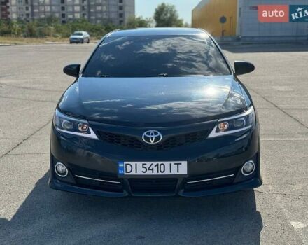Чорний Тойота Камрі, об'ємом двигуна 2.49 л та пробігом 183 тис. км за 12799 $, фото 1 на Automoto.ua