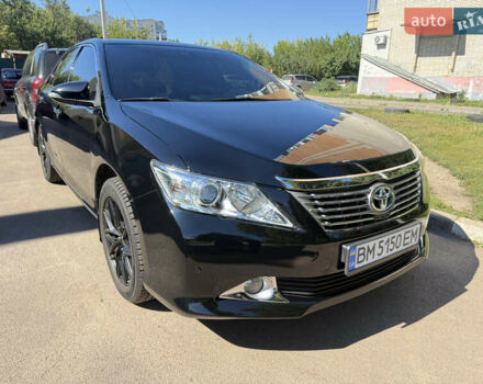 Черный Тойота Камри, объемом двигателя 2.49 л и пробегом 164 тыс. км за 14000 $, фото 1 на Automoto.ua