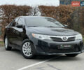 Чорний Тойота Камрі, об'ємом двигуна 2.49 л та пробігом 199 тис. км за 10999 $, фото 2 на Automoto.ua