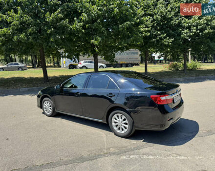 Черный Тойота Камри, объемом двигателя 2.5 л и пробегом 230 тыс. км за 12499 $, фото 6 на Automoto.ua