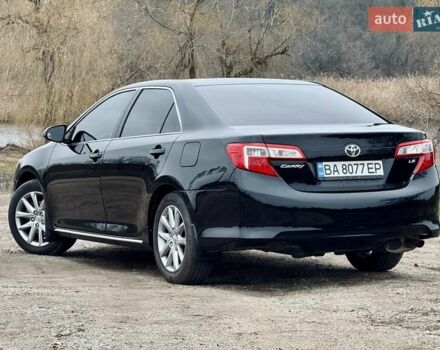 Чорний Тойота Камрі, об'ємом двигуна 2.5 л та пробігом 153 тис. км за 12800 $, фото 2 на Automoto.ua
