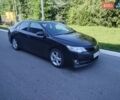 Черный Тойота Камри, объемом двигателя 2.5 л и пробегом 250 тыс. км за 11500 $, фото 1 на Automoto.ua
