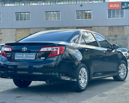 Черный Тойота Камри, объемом двигателя 2.49 л и пробегом 240 тыс. км за 11600 $, фото 2 на Automoto.ua