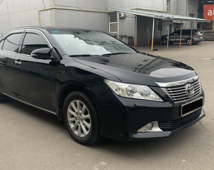 Чорний Тойота Камрі, об'ємом двигуна 2.5 л та пробігом 124 тис. км за 14700 $, фото 1 на Automoto.ua