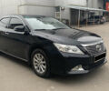 Чорний Тойота Камрі, об'ємом двигуна 2.5 л та пробігом 124 тис. км за 14700 $, фото 1 на Automoto.ua