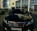 Черный Тойота Камри, объемом двигателя 2.49 л и пробегом 260 тыс. км за 13200 $, фото 2 на Automoto.ua