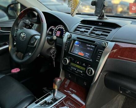 Черный Тойота Камри, объемом двигателя 2.5 л и пробегом 235 тыс. км за 16500 $, фото 22 на Automoto.ua