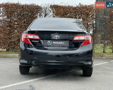 Чорний Тойота Камрі, об'ємом двигуна 2.49 л та пробігом 199 тис. км за 10999 $, фото 14 на Automoto.ua