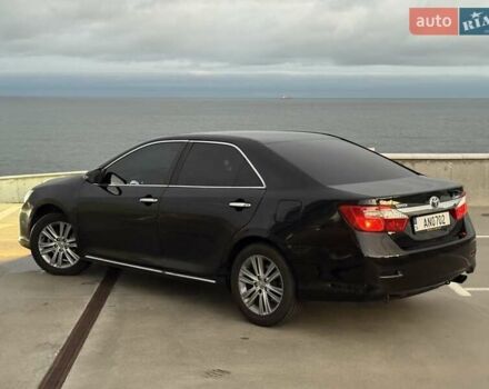 Черный Тойота Камри, объемом двигателя 2.49 л и пробегом 200 тыс. км за 10000 $, фото 15 на Automoto.ua