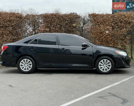 Чорний Тойота Камрі, об'ємом двигуна 2.49 л та пробігом 199 тис. км за 10999 $, фото 23 на Automoto.ua