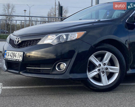 Черный Тойота Камри, объемом двигателя 2.5 л и пробегом 280 тыс. км за 12500 $, фото 12 на Automoto.ua