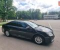 Черный Тойота Камри, объемом двигателя 2.5 л и пробегом 212 тыс. км за 12500 $, фото 1 на Automoto.ua