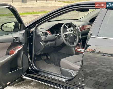Черный Тойота Камри, объемом двигателя 2.49 л и пробегом 175 тыс. км за 12800 $, фото 27 на Automoto.ua