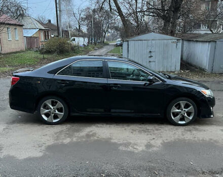 Чорний Тойота Камрі, об'ємом двигуна 2.49 л та пробігом 179 тис. км за 10900 $, фото 2 на Automoto.ua