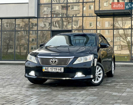 Черный Тойота Камри, объемом двигателя 2.49 л и пробегом 175 тыс. км за 12800 $, фото 2 на Automoto.ua