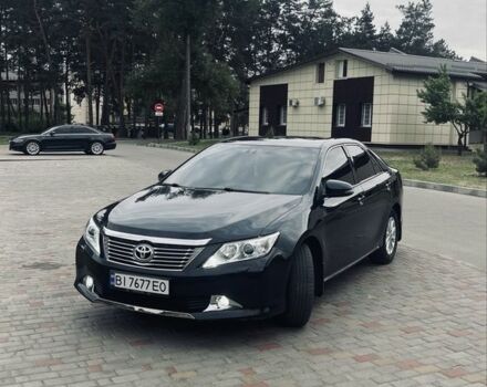 Черный Тойота Камри, объемом двигателя 2.5 л и пробегом 280 тыс. км за 12100 $, фото 18 на Automoto.ua