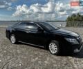 Черный Тойота Камри, объемом двигателя 2.5 л и пробегом 214 тыс. км за 14500 $, фото 1 на Automoto.ua
