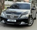 Черный Тойота Камри, объемом двигателя 2.5 л и пробегом 185 тыс. км за 12000 $, фото 1 на Automoto.ua