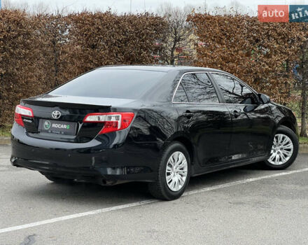 Чорний Тойота Камрі, об'ємом двигуна 2.49 л та пробігом 199 тис. км за 10999 $, фото 21 на Automoto.ua