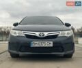 Черный Тойота Камри, объемом двигателя 2.49 л и пробегом 170 тыс. км за 10500 $, фото 1 на Automoto.ua