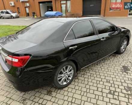 Черный Тойота Камри, объемом двигателя 2.49 л и пробегом 200 тыс. км за 10000 $, фото 22 на Automoto.ua