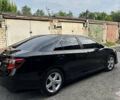 Чорний Тойота Камрі, об'ємом двигуна 2.5 л та пробігом 146 тис. км за 10500 $, фото 1 на Automoto.ua