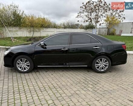 Черный Тойота Камри, объемом двигателя 2.49 л и пробегом 200 тыс. км за 10000 $, фото 25 на Automoto.ua