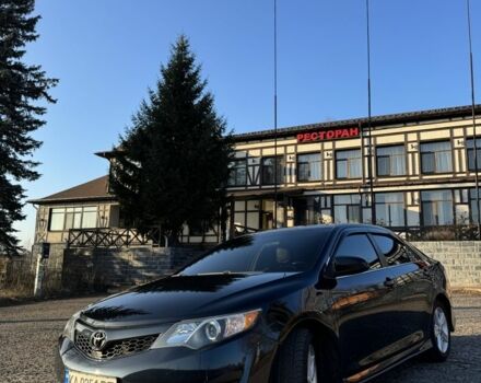 Чорний Тойота Камрі, об'ємом двигуна 2.5 л та пробігом 310 тис. км за 12600 $, фото 1 на Automoto.ua