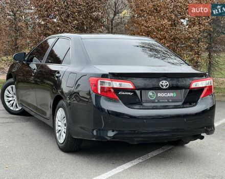 Чорний Тойота Камрі, об'ємом двигуна 2.49 л та пробігом 199 тис. км за 10999 $, фото 15 на Automoto.ua