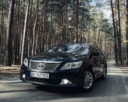 Черный Тойота Камри, объемом двигателя 2.5 л и пробегом 280 тыс. км за 12100 $, фото 6 на Automoto.ua