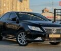 Черный Тойота Камри, объемом двигателя 2.5 л и пробегом 235 тыс. км за 16500 $, фото 1 на Automoto.ua