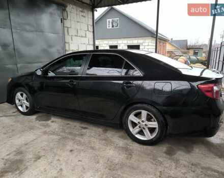 Чорний Тойота Камрі, об'ємом двигуна 2.5 л та пробігом 279 тис. км за 10500 $, фото 3 на Automoto.ua
