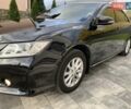 Черный Тойота Камри, объемом двигателя 2.49 л и пробегом 209 тыс. км за 13300 $, фото 1 на Automoto.ua