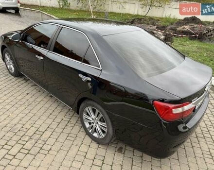 Черный Тойота Камри, объемом двигателя 2.49 л и пробегом 200 тыс. км за 10000 $, фото 24 на Automoto.ua