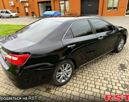 Черный Тойота Камри, объемом двигателя 2.5 л и пробегом 200 тыс. км за 9900 $, фото 4 на Automoto.ua